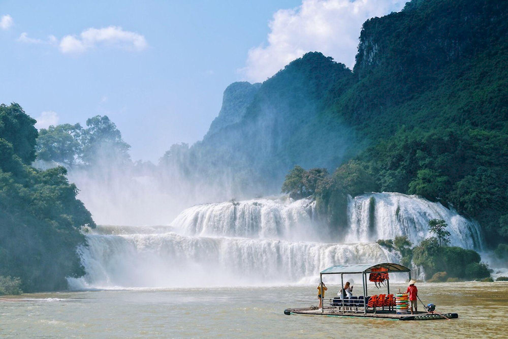 The bamboo raft tour at Ban Gioc Waterfall offers an affordable and unforgettable way to get close to the foot of the falls